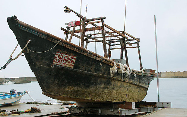 A ship of unknown nationality in Wajima, Ishikawa prefecture, central Japan, after it was found in mid-November off Noto peninsula and was towed to the shore Photo: Kyodo/AP