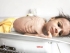 A malnourished child lies on a weighing machine at a therapeutic feeding Centre at Al Sabyeen hospital in Sana’a. (Reuters)